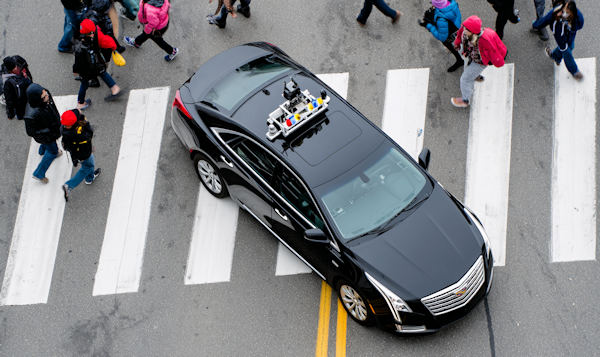 AN autonomous vehicle on a crossing with people